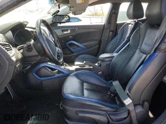 ✅ 2014 Hyundai Veloster Turbo • VIN: KMHTC6AE9EU182472 • Lot: 53327835. Wystawiony na Copart z przebiegiem 122 570 mil. Bezpłatny archiwum sprzedaży aukcyjnych z USA i szczegółowy raport historii pojazdu na DreamBid. Zdjęcie 7.