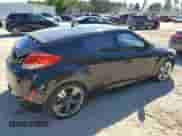 2012 Hyundai Veloster w/Red Int z VIN KMHTC6AD2CU041098, wystawiony jako Copart lot #71175754 z przebiegiem 131 908 mil mil oraz Czysty tytuł • Clean title. Historia ofert i sprzedaży dostępna na DreamBid. Obrazek 3.