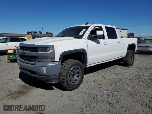 ✅ 2016 Chevrolet Silverado 1500 LT • VIN: 3GCUKREC9GG258445 • Лот: 72461724. Опубликован ранее на Copart с пробегом 242 947 миль. Бесплатный доступ к архиву аукционных продаж из США и подробный отчёт об истории автомобиля на DreamBid. Изображение 1.