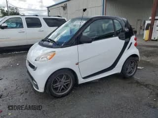 ✅ 2015 Smart fortwo Passion • VIN: WMEEJ3BA5FK811009 • Лот: 69101625. Опубликован ранее на Copart с пробегом 96 685 миль. Бесплатный доступ к архиву аукционных продаж из США и подробный отчёт об истории автомобиля на DreamBid. Изображение 1.