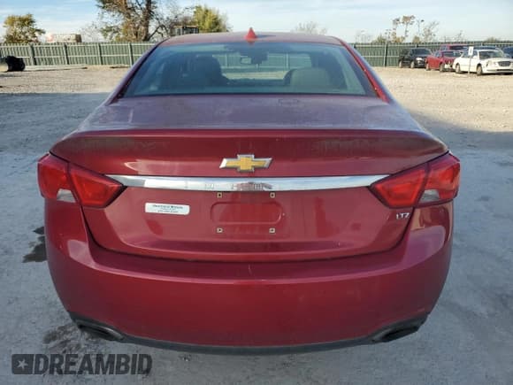 ✅ 2014 Chevrolet Impala LTZ • VIN: 1G1155S3XEU166738 • Lot: 91064455. Listed on Copart with 181,431 mi. Free auction sales archive from the USA and detailed vehicle history report at DreamBid. Image 6.
