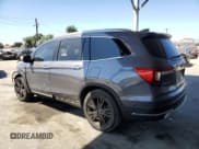 ✅ 2019 Honda Pilot Touring 8-Passenger • VIN: 5FNYF5H90KB043176 • Lot: 71208325. Listed on Copart with 56,580 mi. Free auction sales archive from the USA and detailed vehicle history report at DreamBid. Image 2.