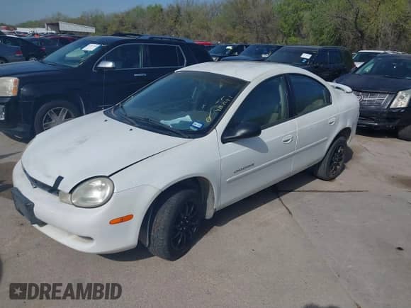2000 Dodge Neon Highline z VIN 1B3ES46C7YD867085, wystawiony jako IAAI lot #41872411 z przebiegiem 190 734 mil mil oraz . Historia ofert i sprzedaży dostępna na DreamBid. Obrazek 2.