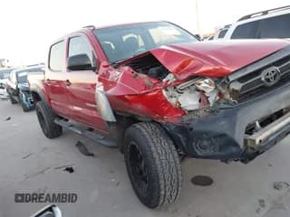 ✅ 2014 Toyota Tacoma PreRunner • VIN: 3TMJU4GN5EM159313 • Lot: 43633698. Listed on IAAI with 124,549 mi. Free auction sales archive from the USA and detailed vehicle history report at DreamBid. Image 1.
