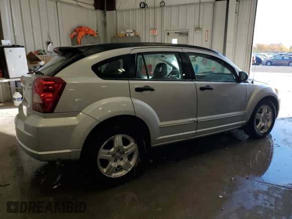2007 Dodge Caliber SXT с VIN 1B3HB48B47D125856, выставлен на аукционе Copart как лот 76956114 с пробегом 147 160 миль миль и На запчасти • Non repairable. История ставок и продаж доступна на DreamBid. Изображение 3.