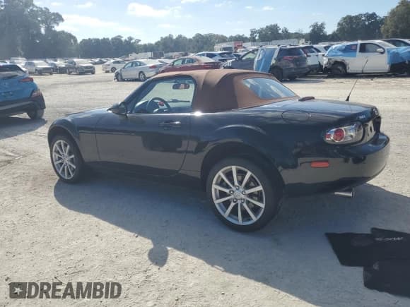 ✅ 2006 Mazda MX-5 Miata Grand Touring • VIN: JM1NC25F660101087 • Lot: 91472985. Wystawiony na Copart z przebiegiem 54 683 mil. Bezpłatny archiwum sprzedaży aukcyjnych z USA i szczegółowy raport historii pojazdu na DreamBid. Zdjęcie 2.