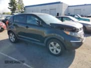 ✅ 2012 Kia Sportage LX • VIN: KNDPB3A21C7345995 • Lot: 51629505. Listed on Copart with 129,255 mi. Free auction sales archive from the USA and detailed vehicle history report at DreamBid. Image 4.