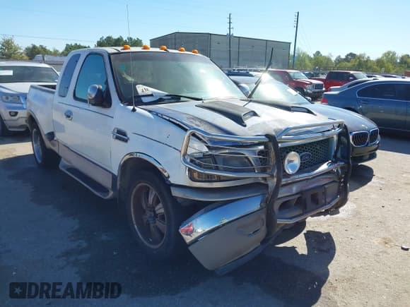 ✅ 1997 Ford F-150 XL • VIN: 2FTDX0765VCA90446 • Lot: 43658347. Listed on IAAI with 129,908 mi. Free auction sales archive from the USA and detailed vehicle history report at DreamBid. Image 1.