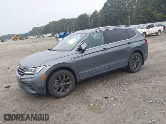 ✅ 2022 Volkswagen Tiguan SE • VIN: 3VV3B7AX2NM058595 • Lot: 43395985. Listed on IAAI with 22,168 mi. Free auction sales archive from the USA and detailed vehicle history report at DreamBid. Image 2.