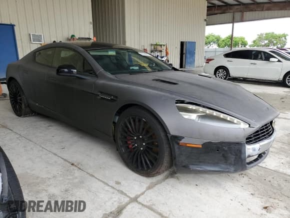 ✅ 2012 Aston Martin Rapide • VIN: SCFHDDAJ7CAF02478 • Lot: 59149215. Wystawiony na Copart z przebiegiem 51 426 mil. Bezpłatny archiwum sprzedaży aukcyjnych z USA i szczegółowy raport historii pojazdu na DreamBid. Zdjęcie 4.