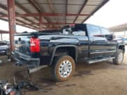 ✅ 2018 GMC Sierra 2500HD Denali • VIN: 1GT12UEY9JF140759 • Lot: 43242746. Listed on IAAI with 102,492 mi. Free auction sales archive from the USA and detailed vehicle history report at DreamBid. Image 4.