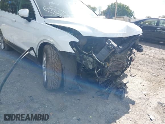 ✅ 2018 Volkswagen Tiguan SEL • VIN: 3VV2B7AX7JM073986 • Лот: 43421376. Опубликован ранее на IAAI с пробегом 128 595 миль. Бесплатный доступ к архиву аукционных продаж из США и подробный отчёт об истории автомобиля на DreamBid. Изображение 19.