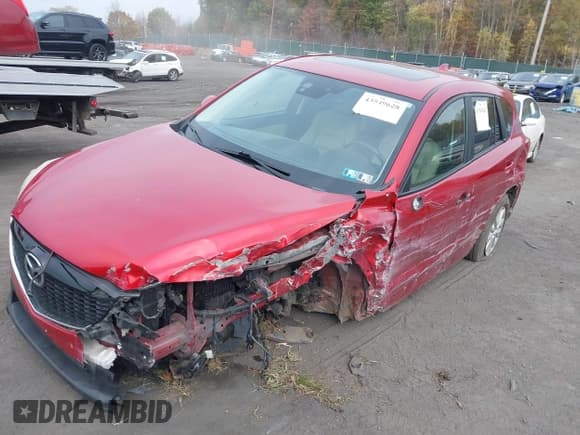 ✅ 2014 Mazda CX-5 Touring • VIN: JM3KE4CY8E0343530 • Lot: 43549628. Listed on IAAI with 133,032 mi. Free auction sales archive from the USA and detailed vehicle history report at DreamBid. Image 6.