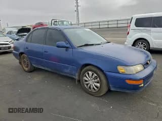 ✅ 1996 Toyota Corolla DX • VIN: 1NXBB02EXTZ500963 • Lot: 94971825. Listed on Copart with 253,439 mi. Free auction sales archive from the USA and detailed vehicle history report at DreamBid. Image 4.