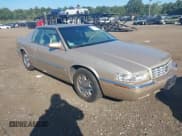 ✅ 1997 Cadillac Eldorado • VIN: 1G6EL12Y4VU602876 • Lot: 43239613. Listed on IAAI with 79,117 mi. Free auction sales archive from the USA and detailed vehicle history report at DreamBid. Image 1.