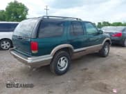 ✅ 1997 Chevrolet Blazer LS • VIN: 1GNDT13W8V2229785 • Lot: 42222096. Wystawiony na IAAI z przebiegiem 244 955 mil. Bezpłatny archiwum sprzedaży aukcyjnych z USA i szczegółowy raport historii pojazdu na DreamBid. Zdjęcie 4.