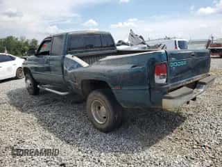 1997 Dodge 3500 with VIN 3B7MF33D2VM592988, listed as a Copart auction lot 64827035 with 386,550 mi miles and Salvage title. Bid and sale history available at DreamBid. Image 2.