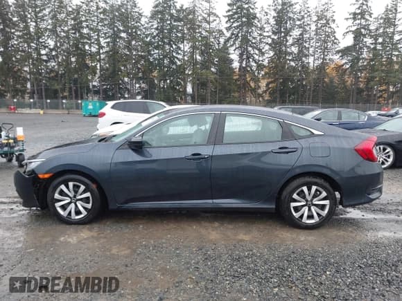 ✅ 2017 Honda Civic LX • VIN: 2HGFC2F57HH542429 • Lot: 43711553. Wystawiony na IAAI z przebiegiem 80 981 mil. Bezpłatny archiwum sprzedaży aukcyjnych z USA i szczegółowy raport historii pojazdu na DreamBid. Zdjęcie 14.