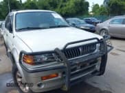 ✅ 1999 Mitsubishi Montero Sport Limited • VIN: JA4MT41R2XP026396 • Lot: 42805074. Wystawiony na IAAI z przebiegiem 124 730 mil. Bezpłatny archiwum sprzedaży aukcyjnych z USA i szczegółowy raport historii pojazdu na DreamBid. Zdjęcie 6.