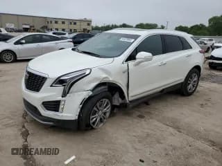 ✅ 2022 Cadillac XT5 FWD Premium Luxury • VIN: 1GYKNCR40NZ169952 • Lot: 54323085. Listed on Copart with 27,894 mi. Free auction sales archive from the USA and detailed vehicle history report at DreamBid. Image 1.