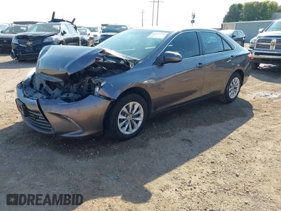 2016 Toyota Camry LE z VIN 4T4BF1FK8GR582035, wystawiony jako IAAI lot #43247554 z przebiegiem 175 993 mil mil oraz . Historia ofert i sprzedaży dostępna na DreamBid. Obrazek 2.
