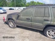 ✅ 2002 Jeep Grand Cherokee Laredo • VIN: 1J4GW48N32C266368 • Lot: 42439741. Listed on IAAI with 109,492 mi. Free auction sales archive from the USA and detailed vehicle history report at DreamBid. Image 6.