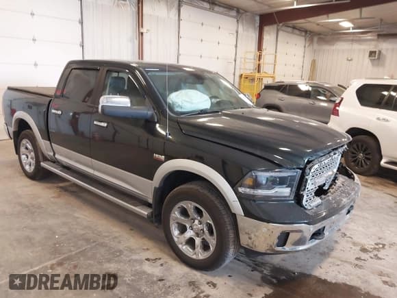 ✅ 2015 Ram 1500 Laramie • VIN: 1C6RR7NT7FS515722 • Lot: 43568705. Listed on IAAI with 118,131 mi. Free auction sales archive from the USA and detailed vehicle history report at DreamBid. Image 1.