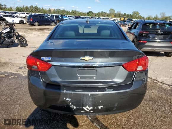 ✅ 2014 Chevrolet Impala LT • VIN: 2G1125S31E9187130 • Лот: 73329174. Опубликован ранее на Copart с пробегом 186 489 миль. Бесплатный доступ к архиву аукционных продаж из США и подробный отчёт об истории автомобиля на DreamBid. Изображение 6.