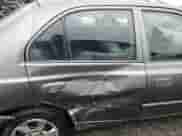 2005 Hyundai Accent GLS z VIN KMHCG45C55U617585, wystawiony jako Copart lot #47449285 z przebiegiem 141 635 mil mil oraz Szkoda całkowita • Salvage title. Historia ofert i sprzedaży dostępna na DreamBid. Obrazek 10.