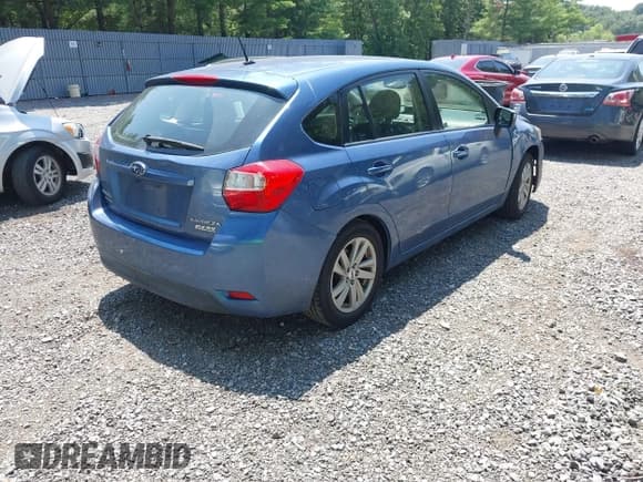 ✅ 2016 Subaru Impreza Premium • VIN: JF1GPAB62G8261357 • Lot: 42830407. Listed on IAAI with 98,352 mi. Free auction sales archive from the USA and detailed vehicle history report at DreamBid. Image 4.