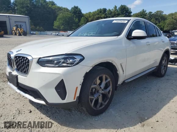 ✅ 2022 BMW X4 xDrive30i • VIN: 5UX33DT00N9K09666 • Лот: 71523435. Опубликован ранее на Copart с пробегом 49 256 миль. Бесплатный доступ к архиву аукционных продаж из США и подробный отчёт об истории автомобиля на DreamBid. Изображение 1.