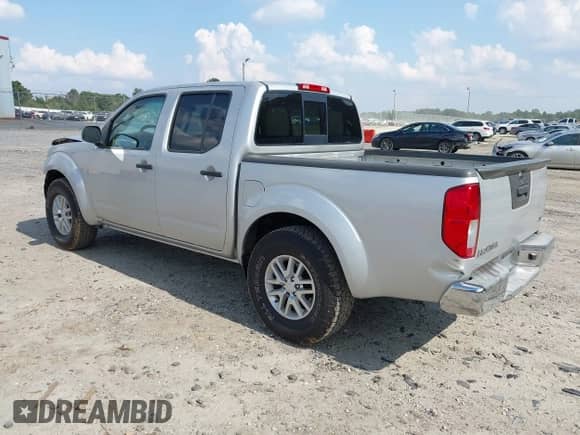 2014 Nissan Frontier Desert Runner z VIN 1N6AD0ER0EN733673, wystawiony jako IAAI lot #43260104 z przebiegiem 163 382 mil mil oraz . Historia ofert i sprzedaży dostępna na DreamBid. Obrazek 3.
