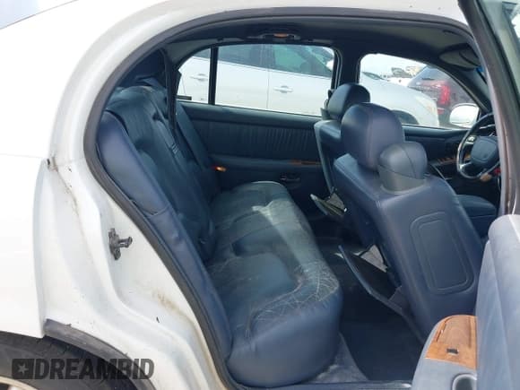 ✅ 2000 Buick Park Avenue • VIN: 1G4CW52KXY4161463 • Lot: 42481927. Listed on IAAI with 210,886 mi. Free auction sales archive from the USA and detailed vehicle history report at DreamBid. Image 8.