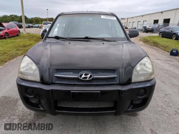 2005 Hyundai Tucson GL z VIN KM8JM12BX5U071182, wystawiony jako Copart lot #74852974 z przebiegiem 74 235 mil mil oraz Szkoda całkowita • Salvage title. Historia ofert i sprzedaży dostępna na DreamBid. Obrazek 5.