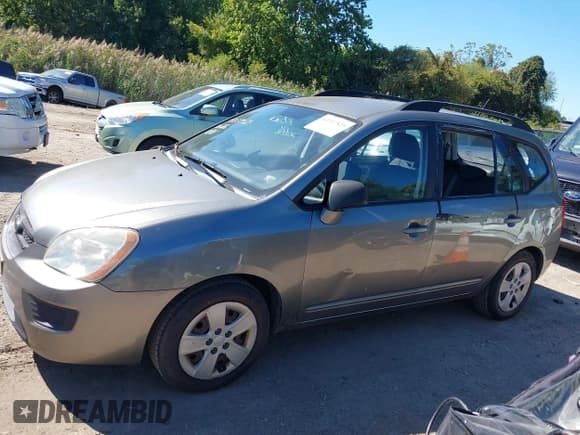 ✅ 2009 Kia Rondo LX • VIN: KNAFG528297284979 • Lot: 43337525. Listed on IAAI with 140,396 mi. Free auction sales archive from the USA and detailed vehicle history report at DreamBid. Image 6.