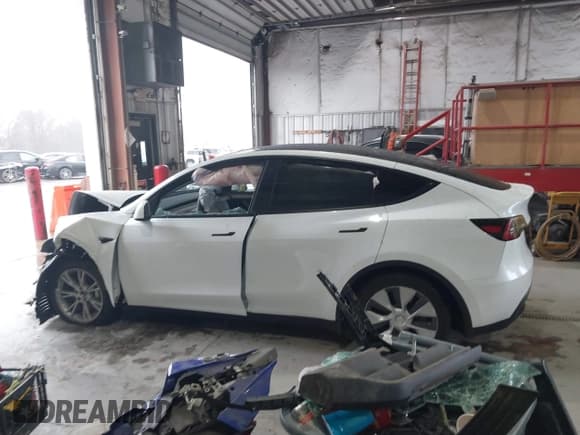 ✅ 2023 Tesla Model Y Long Range • VIN: 7SAYGAEEXPF789037 • Lot: 41551605. Listed on IAAI with 8,630 mi. Free auction sales archive from the USA and detailed vehicle history report at DreamBid. Image 14.