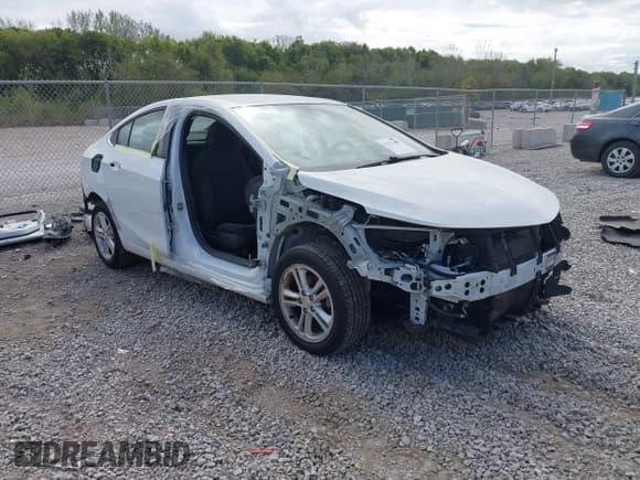 ✅ 2017 Chevrolet Cruze LT • VIN: 1G1BE5SM1H7210674 • Lot: 43377485. Listed on IAAI with 111,887 mi. Free auction sales archive from the USA and detailed vehicle history report at DreamBid. Image 1.