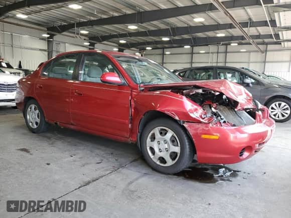 2003 Hyundai Elantra GLS with VIN KMHDN45D53U706119, listed as a Copart auction lot 68493304 with 132,529 mi miles and Salvage title. Bid and sale history available at DreamBid. Image 4.