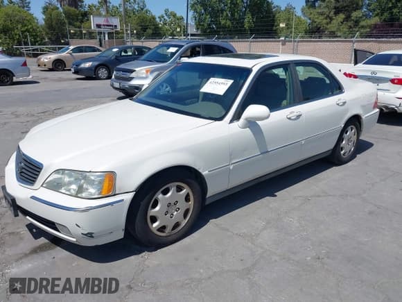 ✅ 1999 Acura RL • VIN: JH4KA965XXC008773 • Lot: 42554593. Listed on IAAI with 303,785 mi. Free auction sales archive from the USA and detailed vehicle history report at DreamBid. Image 2.