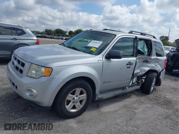 ✅ 2011 Ford Escape Hybrid • VIN: 1FMCU4K3XBKC60103 • Lot: 42048614. Wystawiony na IAAI z przebiegiem 125 354 mil. Bezpłatny archiwum sprzedaży aukcyjnych z USA i szczegółowy raport historii pojazdu na DreamBid. Zdjęcie 6.