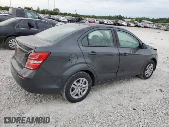 2017 Chevrolet Sonic LS с VIN 1G1JB5SH5H4137673, выставлен на аукционе Copart как лот 69697674 с пробегом 106 229 миль миль и Списание • Salvage title. История ставок и продаж доступна на DreamBid. Изображение 3.