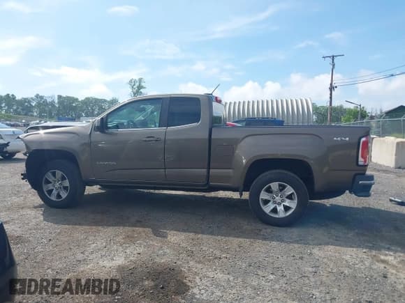 ✅ 2015 GMC Canyon 4WD SLE • VIN: 1GTH6BE3XF1158400 • Lot: 42357226. Listed on IAAI with 127,187 mi. Free auction sales archive from the USA and detailed vehicle history report at DreamBid. Image 14.