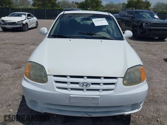 2003 Hyundai Accent GL z VIN KMHCG45C53U468978, wystawiony jako IAAI lot #41999193 z przebiegiem 105 514 mil mil oraz . Historia ofert i sprzedaży dostępna na DreamBid. Obrazek 12.