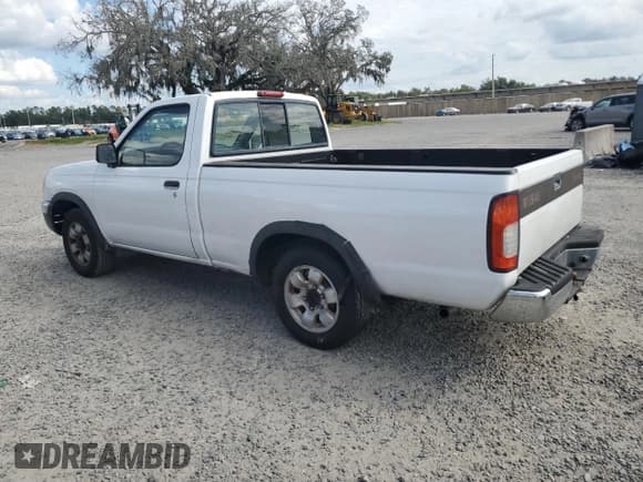 ✅ 1998 Nissan Frontier XE • VIN: 1N6DD21SXWC387985 • Lot: 84769815. Listed on Copart with 184,959 mi. Free auction sales archive from the USA and detailed vehicle history report at DreamBid. Image 2.