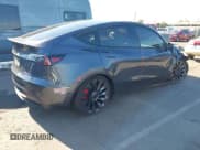 ✅ 2023 Tesla Model Y Performance • VIN: 7SAYGDEF3PF864400 • Lot: 43595150. Wystawiony na IAAI z przebiegiem 37 993 mil. Bezpłatny archiwum sprzedaży aukcyjnych z USA i szczegółowy raport historii pojazdu na DreamBid. Zdjęcie 4.