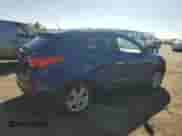 2011 Hyundai Tucson Limited with VIN KM8JUCAC3BU244297, listed as a Copart auction lot 48629585 with 208,270 mi miles and Salvage title. Bid and sale history available at DreamBid. Image 3.