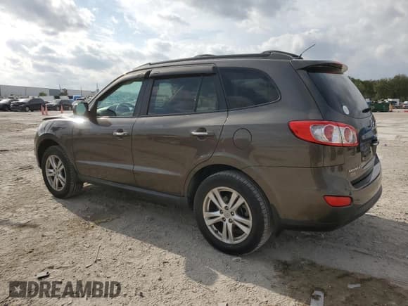 ✅ 2012 Hyundai Santa Fe Limited • VIN: 5XYZK3AB6CG152575 • Lot: 87521685. Listed on Copart with 92,260 mi. Free auction sales archive from the USA and detailed vehicle history report at DreamBid. Image 2.