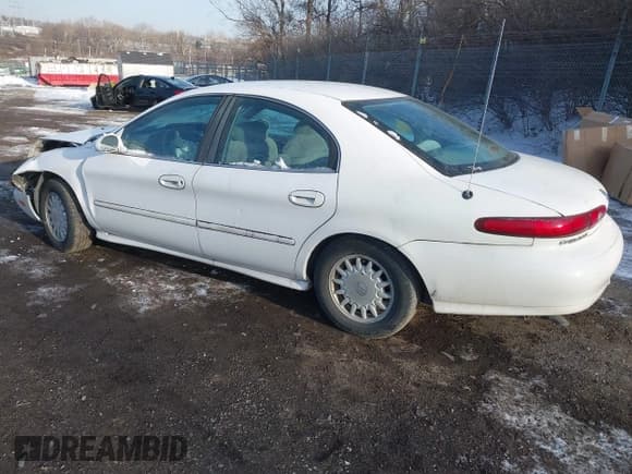 ✅ 1997 Mercury Sable GS • VIN: 1MELM50U6VA657452 • Лот: 41415751. Опубликован ранее на IAAI с пробегом 185 235 миль. Бесплатный доступ к архиву аукционных продаж из США и подробный отчёт об истории автомобиля на DreamBid. Изображение 3.