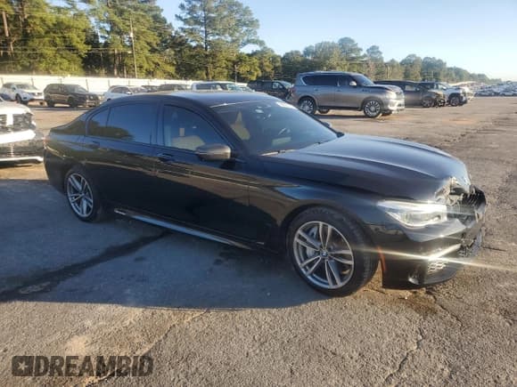 ✅ 2017 BMW 7 Series ALPINA B7 xDrive • VIN: WBA7F2C56HG422385 • Lot: 90929155. Listed on Copart with 65,752 mi. Free auction sales archive from the USA and detailed vehicle history report at DreamBid. Image 4.