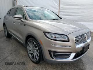 ✅ 2019 Lincoln Nautilus Reserve • VIN: 2LMPJ6LP0KBL17821 • Лот: 64954332. Опубликован ранее на Copart с пробегом 35 620 миль. Бесплатный доступ к архиву аукционных продаж из США и подробный отчёт об истории автомобиля на DreamBid. Изображение 1.